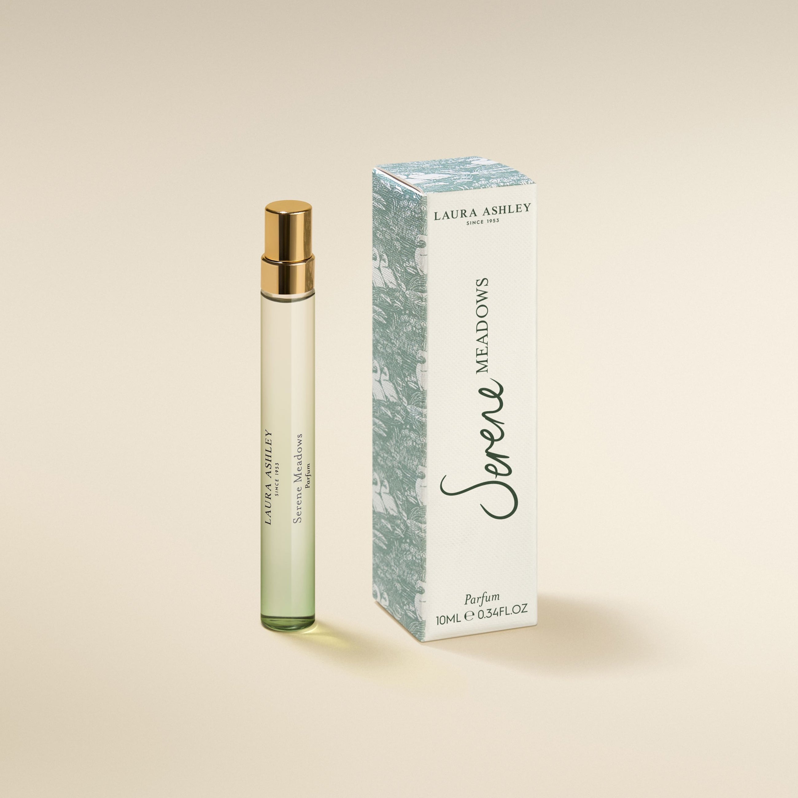 Laura Ashley Serene Meadows perfume bottle and packaging on a beige background