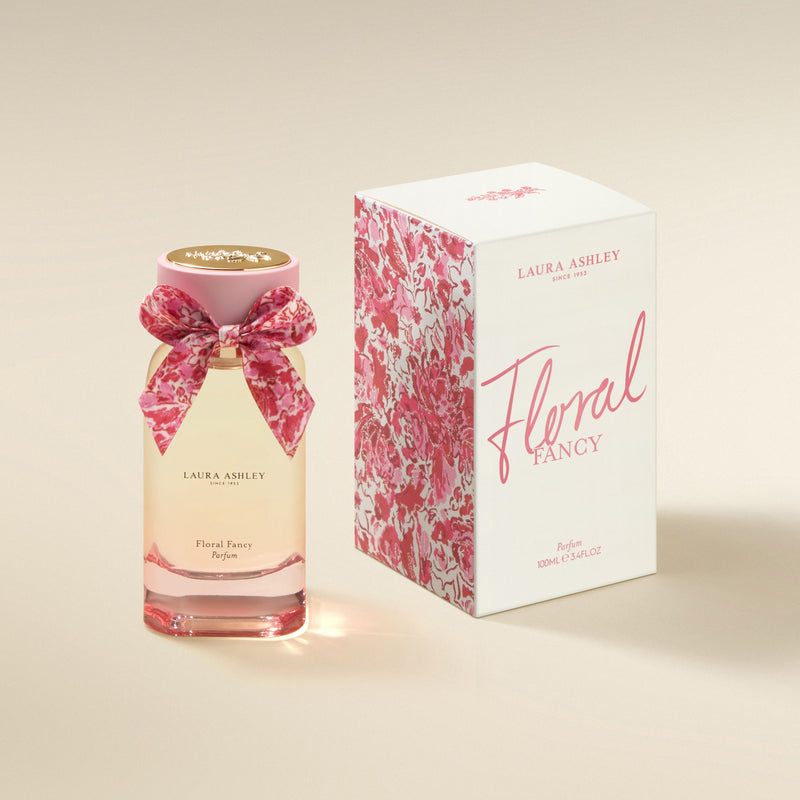 Laura Ashley Floral Fancy perfume bottle and packaging on a beige background