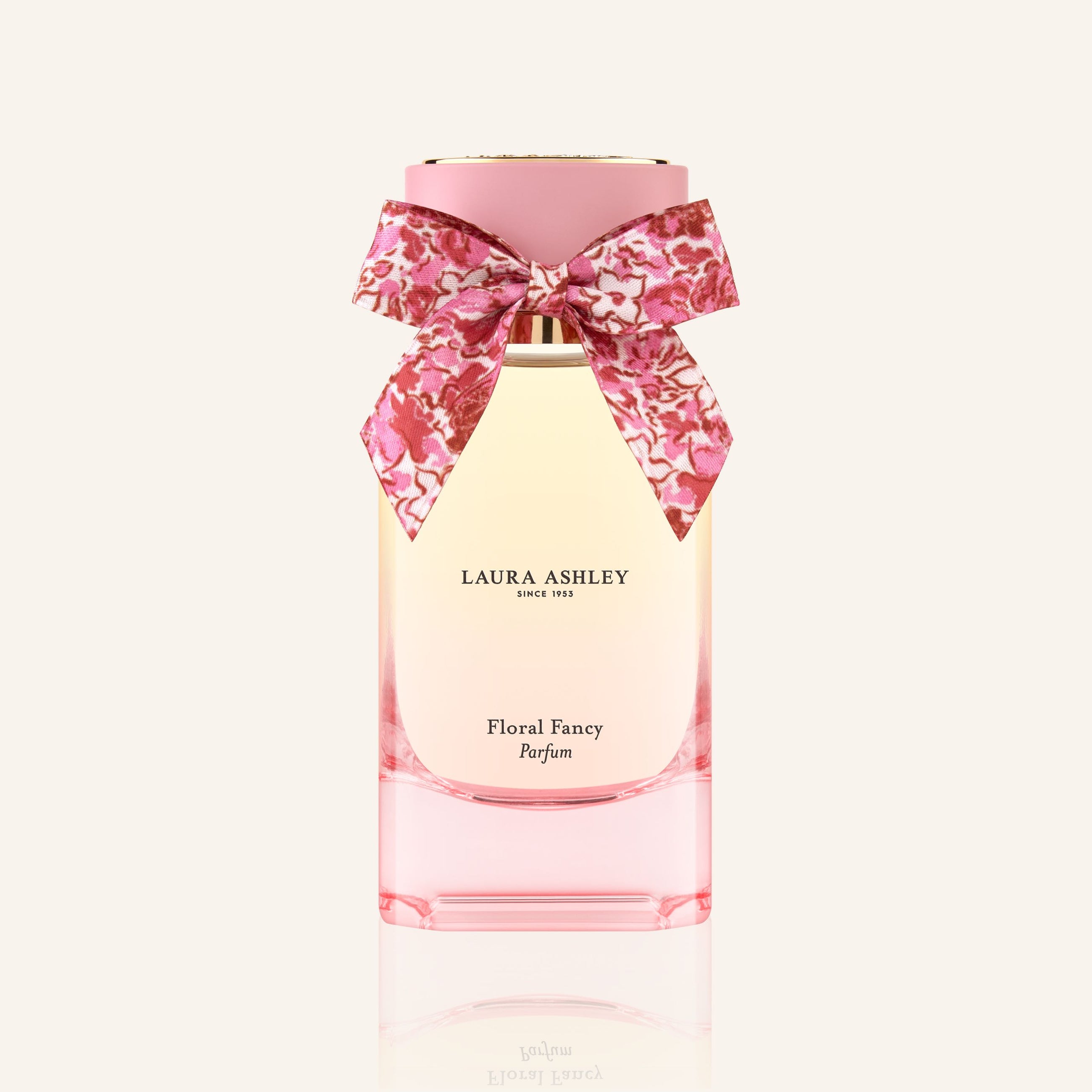 Laura Ashley Floral Fancy perfume bottle with a pink bow on a white background