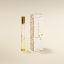 Laura Ashley 'oy of Primrose perfume bottle and packaging on a beige background