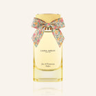 Laura Ashley perfume bottle with a floral bow on a white background
