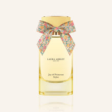 Laura Ashley perfume bottle with a floral bow on a white background