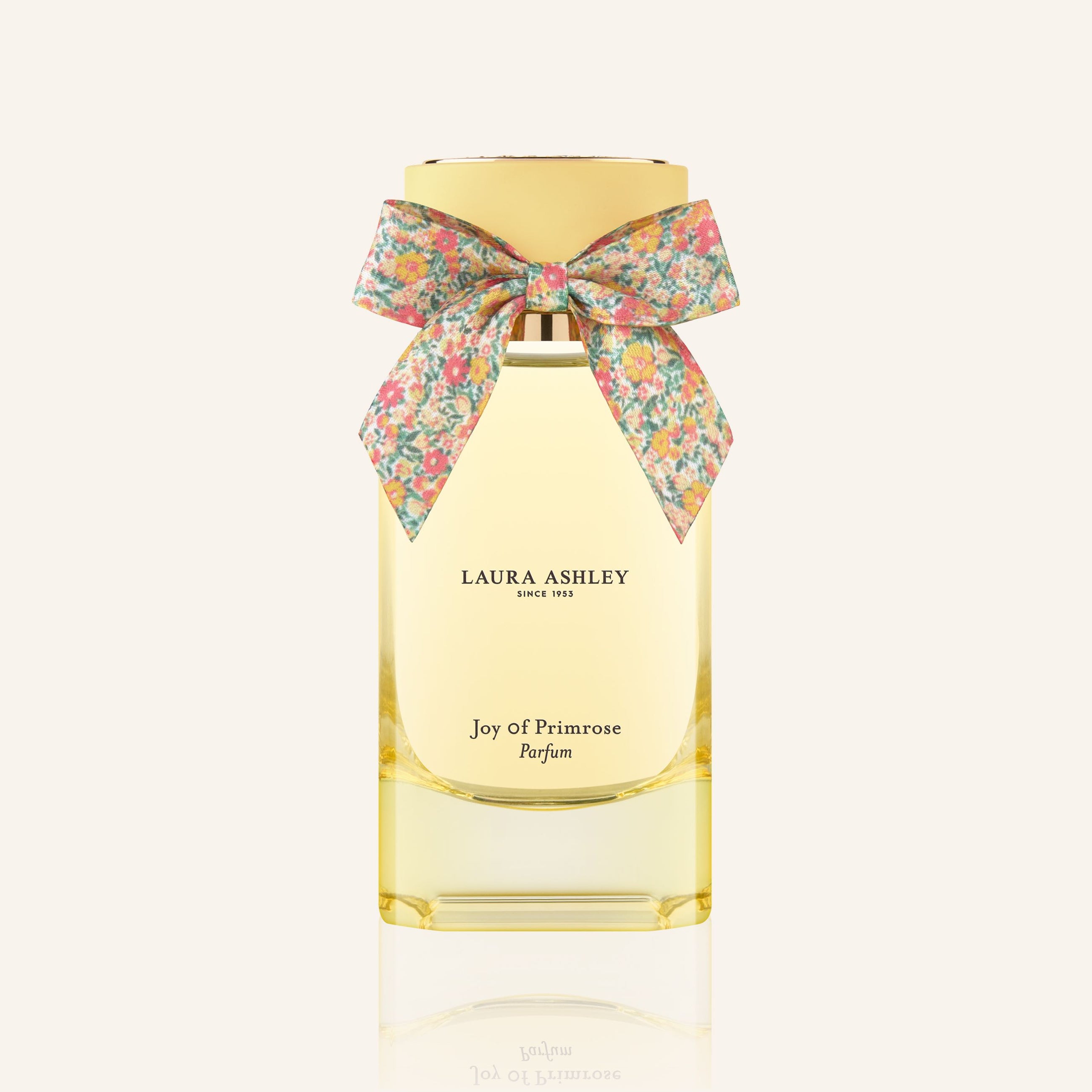 Laura Ashley perfume bottle with a floral bow on a white background