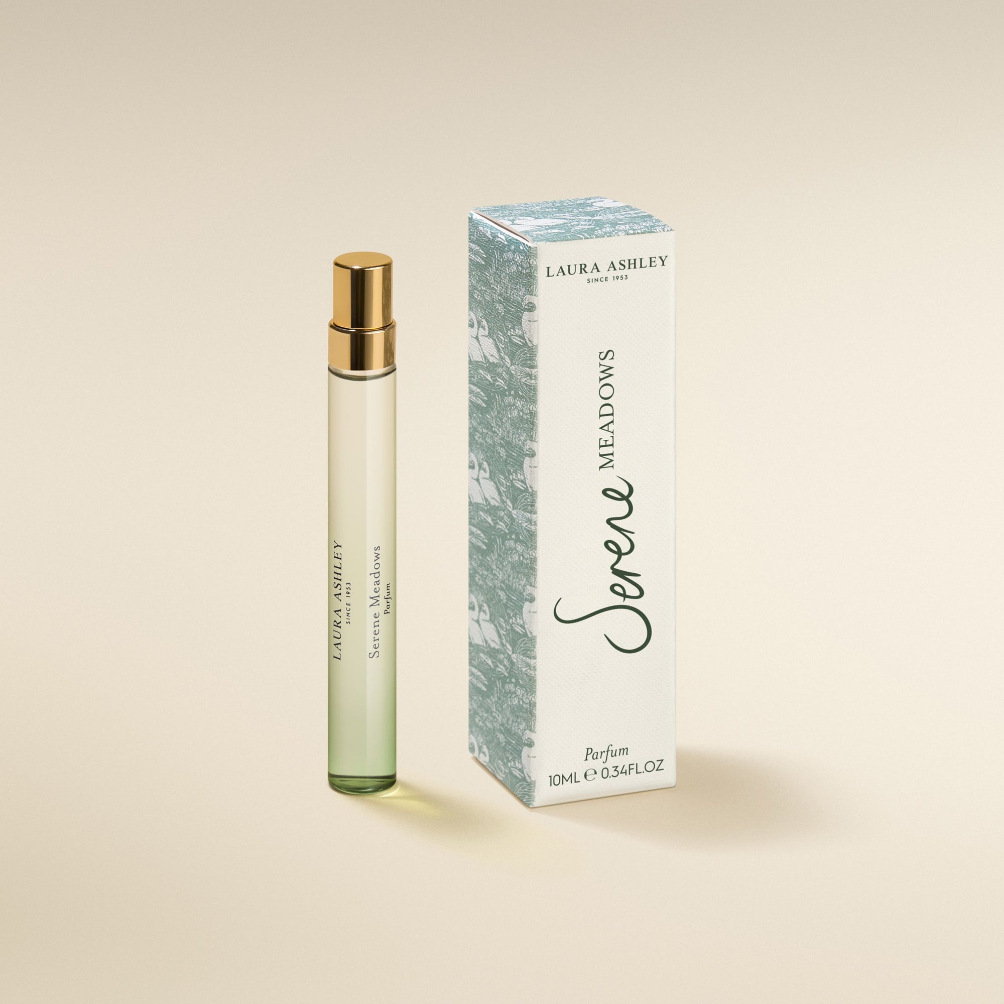 Laura Ashley Serene Meadows perfume bottle and packaging on a beige background