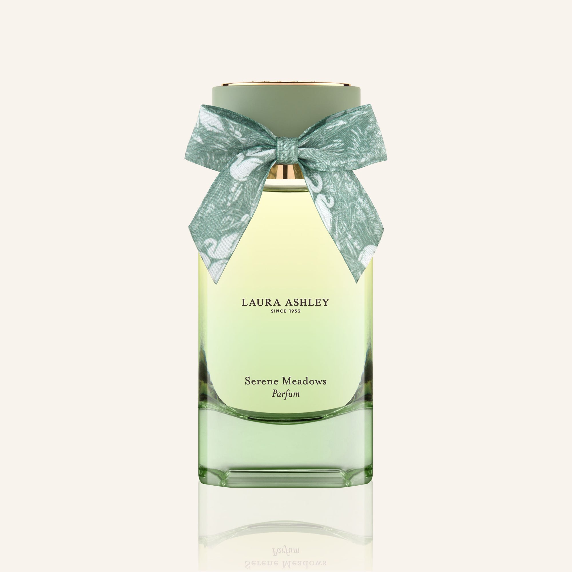 Laura Ashley Serene Meadows perfume bottle with a bow on a white background