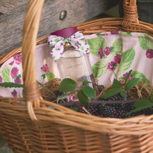 Wild Woodland fragrance by Laura Ashley parfum bottle in basket